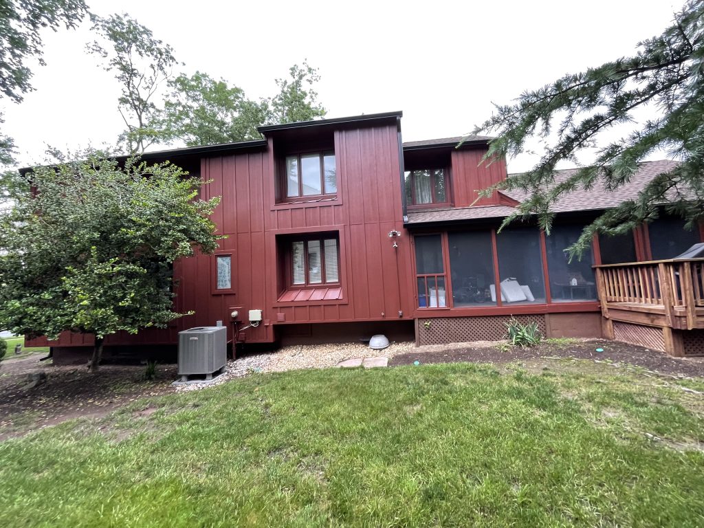 Home with new red hardie siding and trim by Macbeth Roofing in Culpeper Virginia
